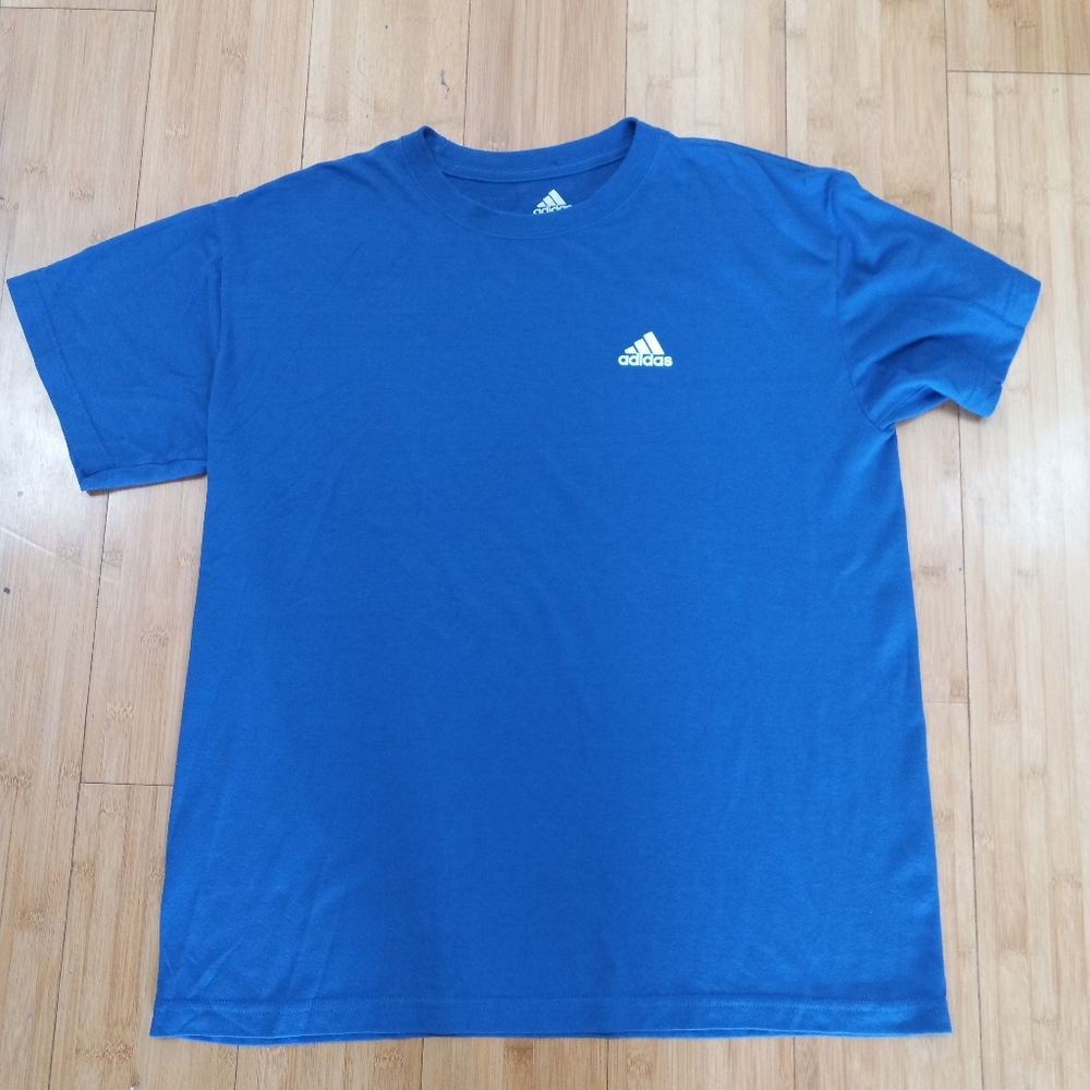 Blue shirt sleeve Adidas t shirt.